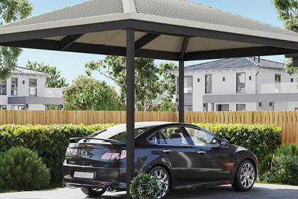 Hip roof carport with black sedan parked beneath