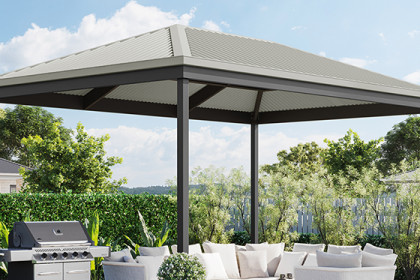 Hip roof pergola with outdoor furniture