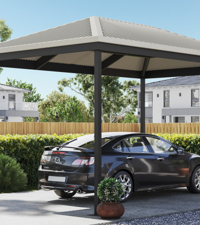 Hip roof carport with black car parked beneath