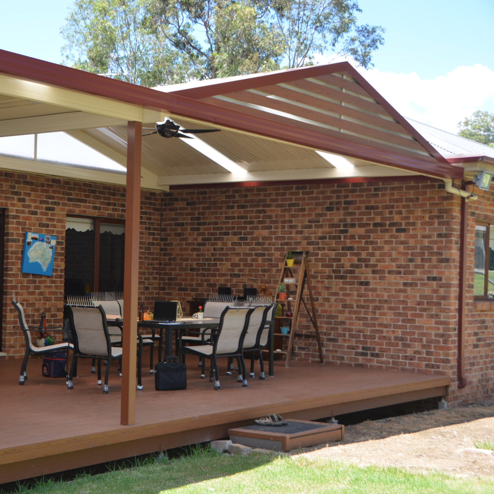 Patio with flat gable combination roof