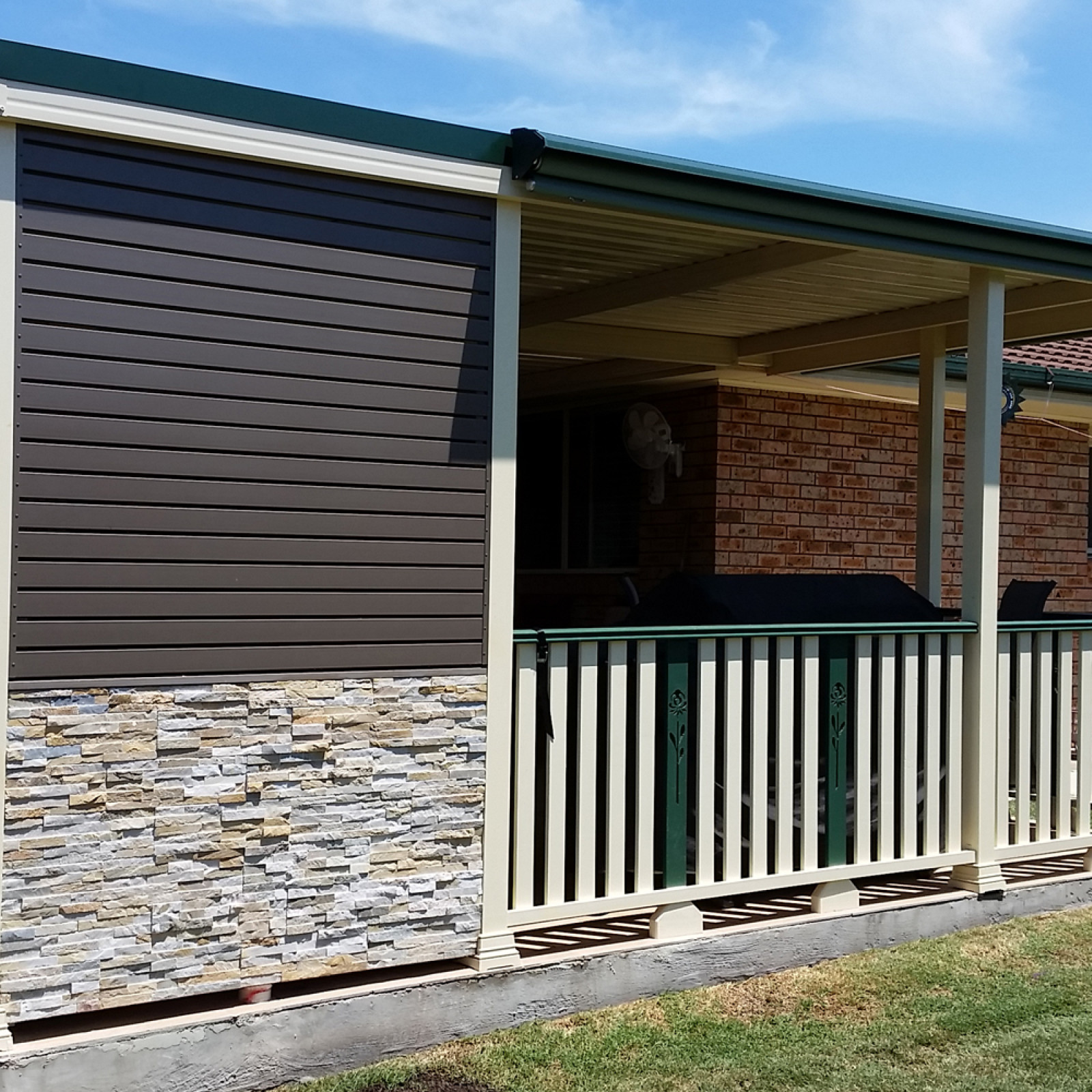 Flat roof patio with BBQ cover outside view