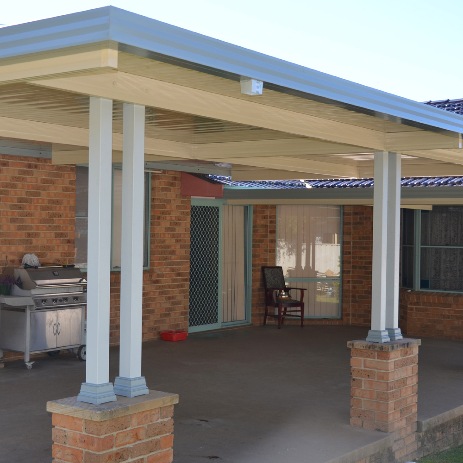 Patio flat roof with sunset panels