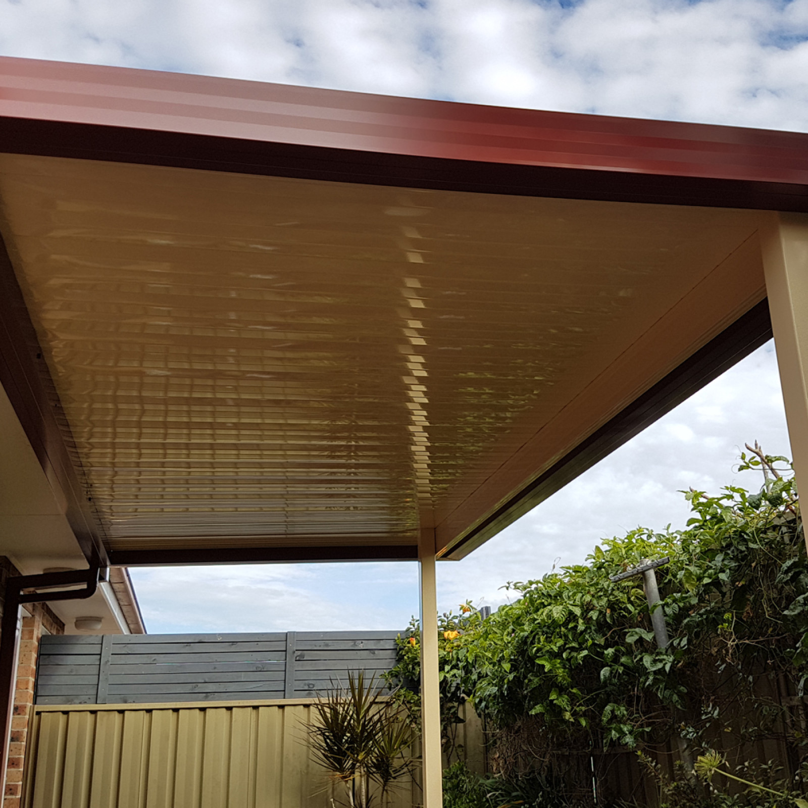 Flat roof patio attached to dwelling